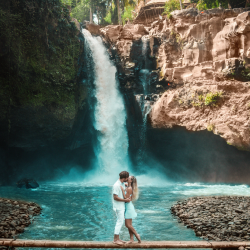 Couple in front of a waterfall in Bali